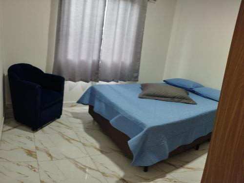Un pat sau paturi într-o cameră la Morada dos eucaliptos