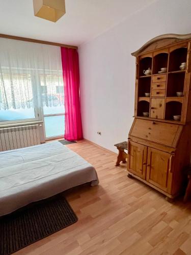 Ένα ή περισσότερα κρεβάτια σε δωμάτιο στο Apartamenty w Poznaniu