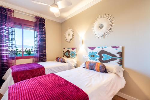 Tempat tidur dalam kamar di Ubicación Perfecta Apartamento Luxury Beach
