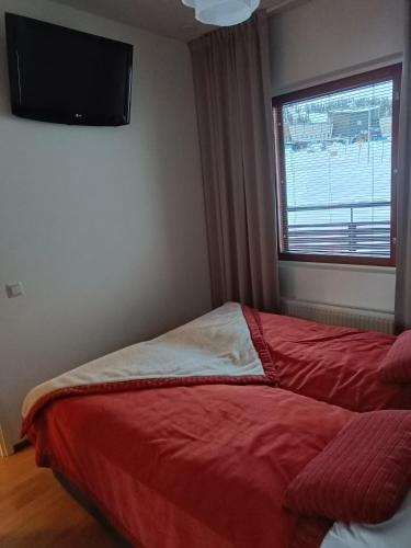 Katil atau katil-katil dalam bilik di Ylläs Chalet 8107
