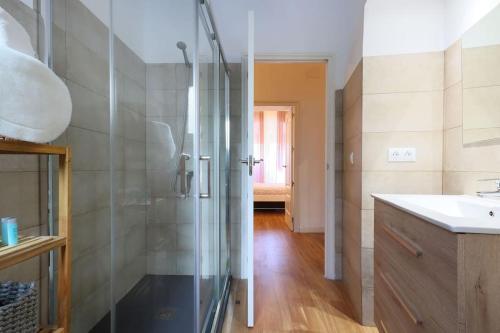 a bathroom with a shower and a sink at Posada de la Judería II in Córdoba