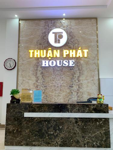 a sign for a thorean plant house in a building at Thuan Phat House Soc Trang in Soc Trang