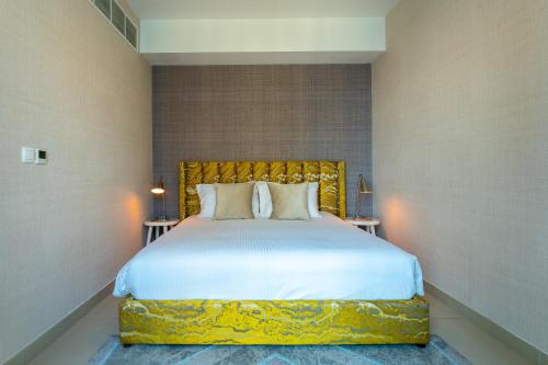 Postel nebo postele na pokoji v ubytování Bellavista - High Floor - 1BR 29 Boulevard - Burj Khalifa & Fountain View