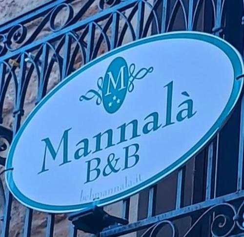 a sign for a manzanilla best bar at B&B Mannalà in Agrigento