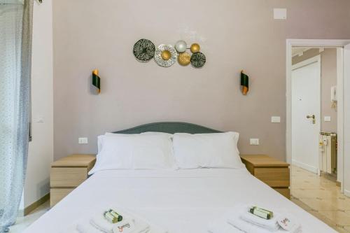 Un pat sau paturi într-o cameră la Il rifugio dei nonni by Rentbeat