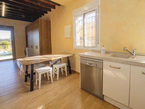 Kuchyň nebo kuchyňský kout v ubytování Cubo's Villa Di Hermosa Relax