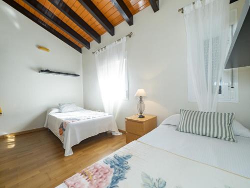 Postel nebo postele na pokoji v ubytování Cubo's Villa Di Hermosa Relax
