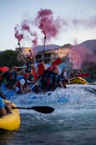 a group of people on a raft in the water at Hotel GOLD JET Bihać in Bihać
