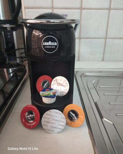 a coffee maker is sitting on a kitchen counter at La casetta di zia Giuseppina in Alberobello