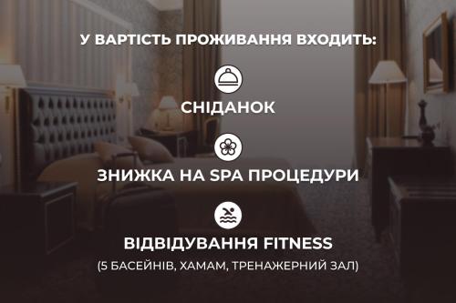 a screenshot of a hotel room with descriptions of a bedroom at Hotel Misto SPA & FITNESS in Kharkiv