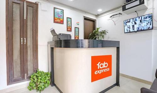 a lectern in a room with aflat services sign on it at FabExpress Premium Room I in New Delhi