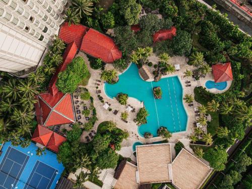 an overhead view of a resort with a swimming pool at Grand Hyatt Jakarta in Jakarta