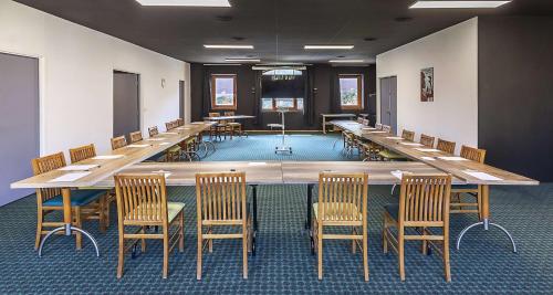 a large conference room with a long table and chairs at Sure Hotel by Best Western Annecy in Annecy