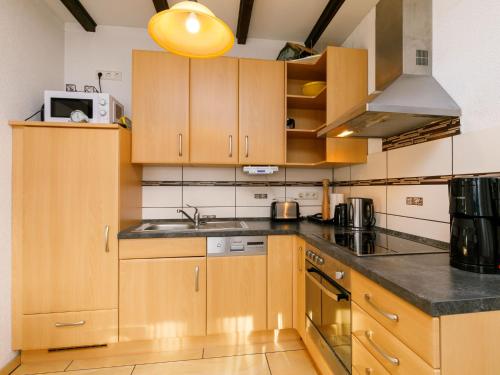 Η κουζίνα ή μικρή κουζίνα στο Holiday Home Petra by Interhome