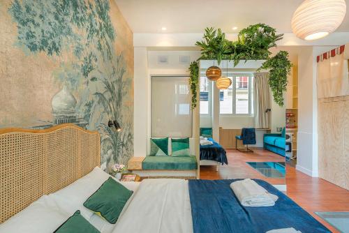 a bedroom with a bed and a living room at Séjour au Taj proche Tour-Eiffel in Paris