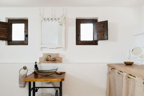 a kitchen with a bowl on a wooden table at Casa Brava - Algarve in Loulé