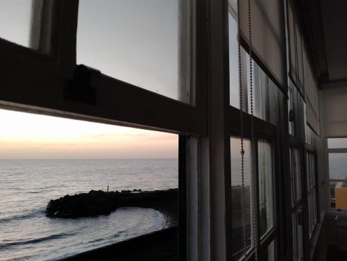 a view of the ocean from a window at The Sea Corner in Santa Cruz de la Palma
