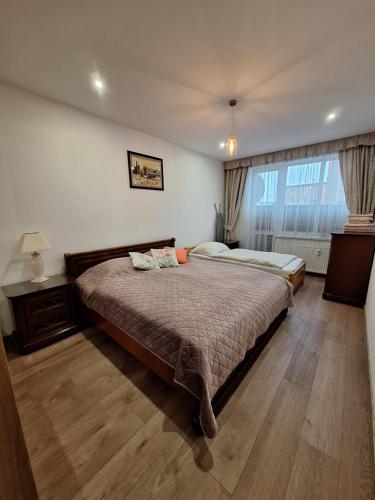 Ένα ή περισσότερα κρεβάτια σε δωμάτιο στο Diana Apartments