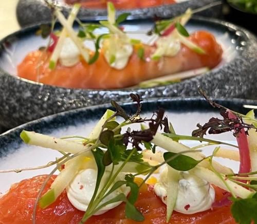 a plate of food with some food on it at Logis des Sittelles in Montfort-le-Gesnois