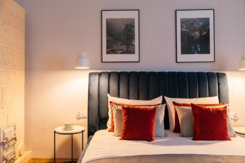 Кровать или кровати в номере Penthouse Cracovian - LoftAffair