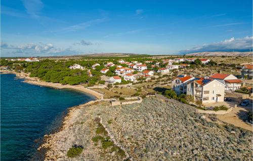 an aerial view of a town next to the water at Vila Sidro in Košljun