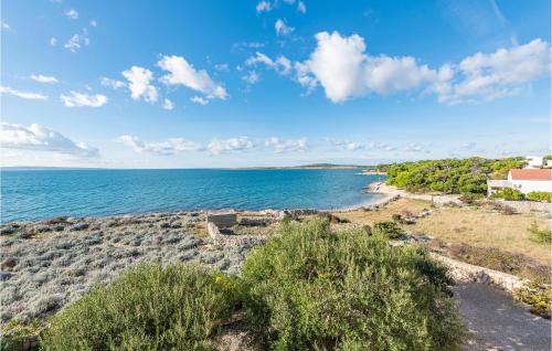 a view of the ocean from a bluff at Vila Sidro in Košljun