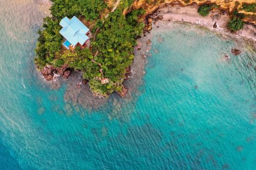 an aerial view of an island in the ocean at Secret Bay in Portsmouth