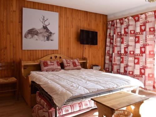 En eller flere senge i et værelse på Appartement Méribel, 2 pièces, 4 personnes - FR-1-180-551