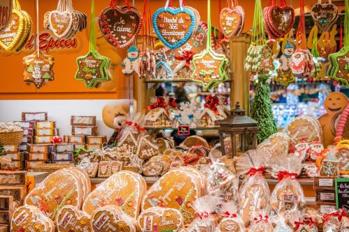 a display of christmas ornaments in a store at Cosy apartment on Strasbourg Tramway line and Canal - Appartement confortable sur ligne tram Strasbourg et Canal in Bischheim