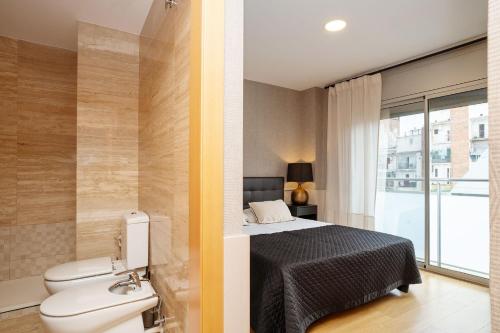 Postel nebo postele na pokoji v ubytování Modern apartment near Pl. España