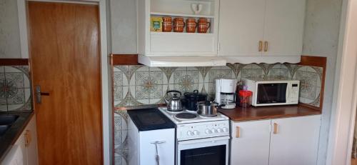 Kuchyň nebo kuchyňský kout v ubytování Villa Skomakar Kramfors