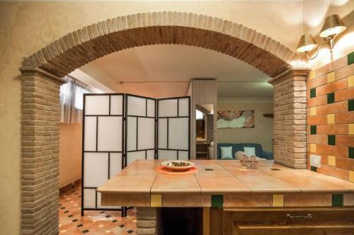 A kitchen or kitchenette at Casa Vacanze Polifemo Loft