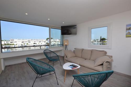 Marina des Camarguaises - Vue port - 6 personnes - Climatisation - Wifi - Parking
