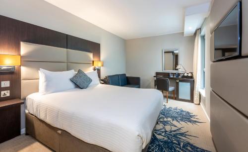 Postel nebo postele na pokoji v ubytování Mercure Edinburgh Haymarket