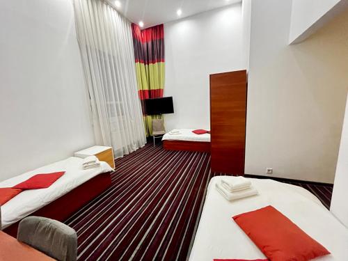 Cama ou camas em um quarto em Hotel Kalyna
