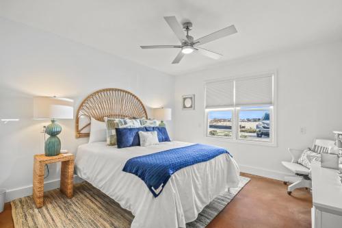 a bedroom with a bed and a ceiling fan at Coastal Gem of Murrells Inlet in Myrtle Beach