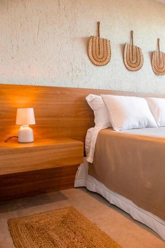 Ένα ή περισσότερα κρεβάτια σε δωμάτιο στο Casa Zero Meia Pysá, Milagres