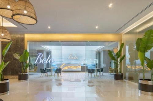 a lobby of a hotel with chairs and a table at Dreamy Aesthetic Suite in City Center in Cebu City