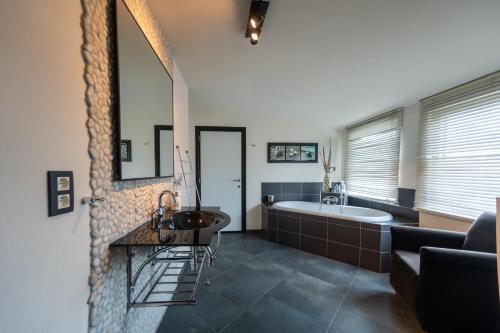 Fotografie z fotogalerie ubytování Guesthouse De Witte Merel Deluxe v destinaci Tessenderlo