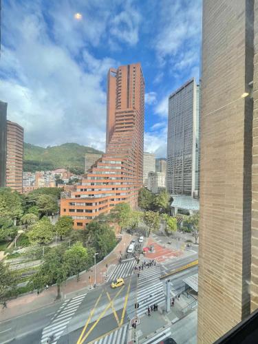 a view of a city with tall buildings at Mitika Cultura movilidad y tranquilidad in Bogotá