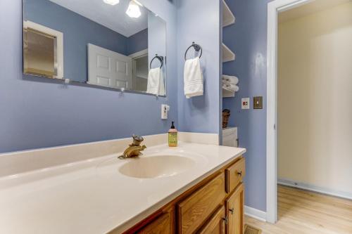 a bathroom with a sink and a mirror at 2 Bed 2 Bath Vacation home in Whittier I in Whittier