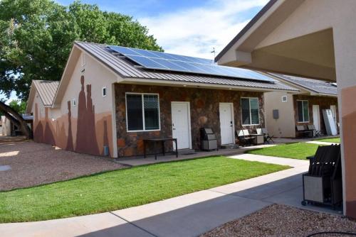 a house with solar panels on the roof at Bunkhouse 4B With 3 Beds in La Verkin