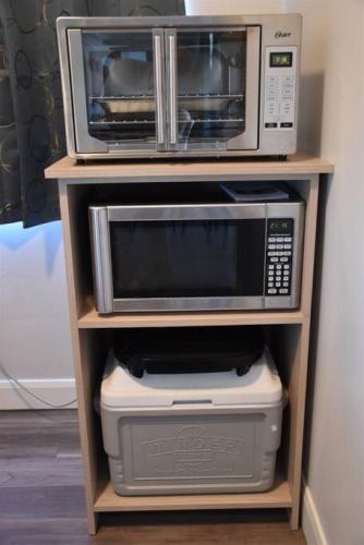 Kuchyň nebo kuchyňský kout v ubytování LV5 Upper Floor Suite