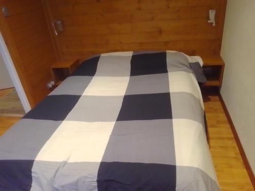 Llit o llits en una habitació de Appt Ponteil