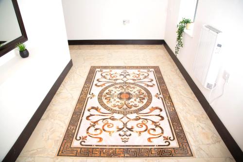 a hallway with a rug on a floor at Manchester Apartments by BEVOLVE - Free Parking in Manchester