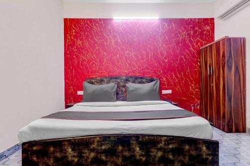 Postel nebo postele na pokoji v ubytování Hotel O One Plus One Residency
