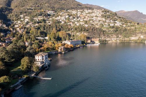 an aerial view of a town on a lake at Cernobbio lake suites in Cernobbio