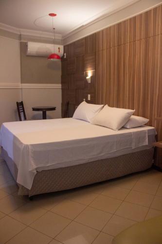 Postel nebo postele na pokoji v ubytování Firenze Hotel Votuporanga