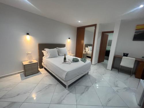 Ένα ή περισσότερα κρεβάτια σε δωμάτιο στο Residencial Santo Amaro