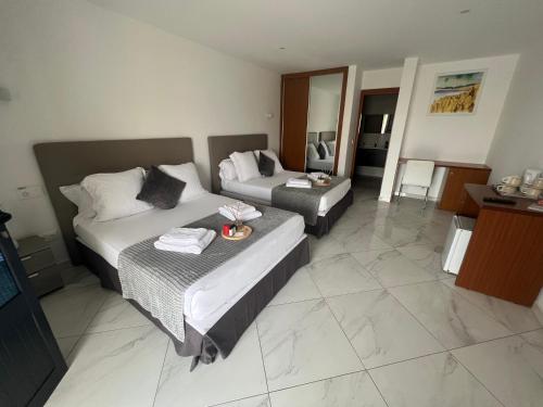 Ένα ή περισσότερα κρεβάτια σε δωμάτιο στο Residencial Santo Amaro